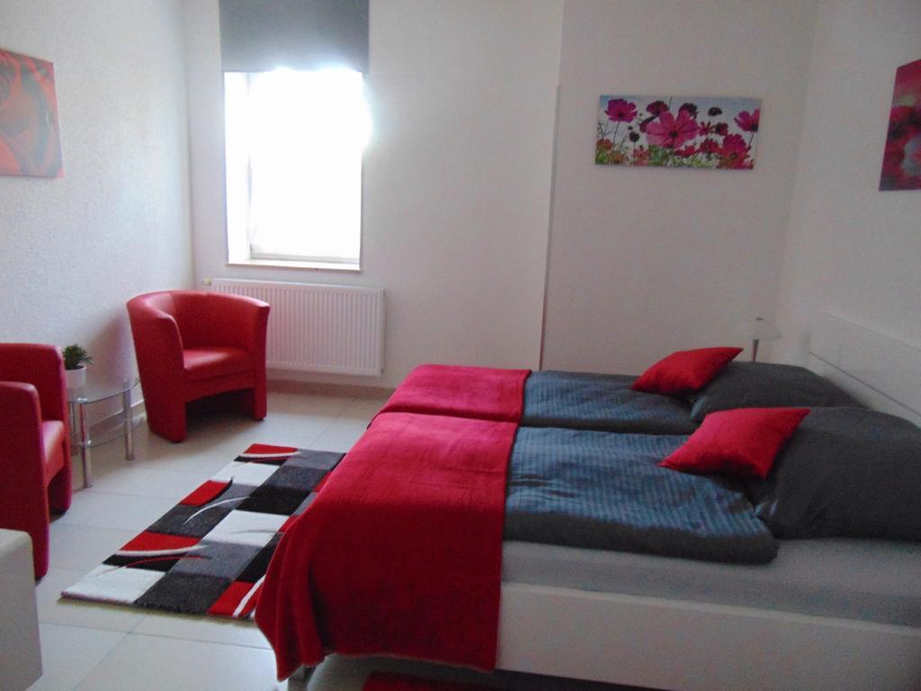 Ambiente Hotel Leipzig Quarto foto